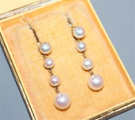 A pair of 1950s Swedish 18k and graduated cultured pearl drop earrings, drop 34mm.